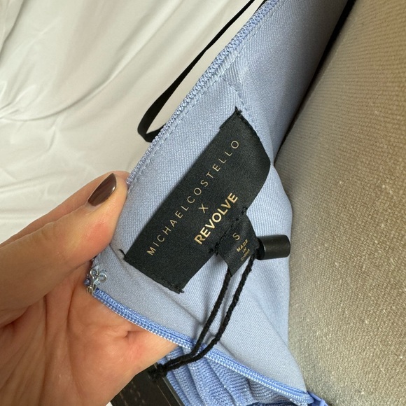 x REVOLVE India Midi Dress in Periwinkle
Michael Costello
Color: Periwinkle - Picture 6 of 10